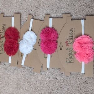 A set of 4 baby girl headbands Rachel's ribbons red, white and 2 different pink